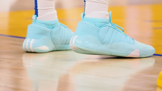 James Harden's blue and white adidas sneakers.